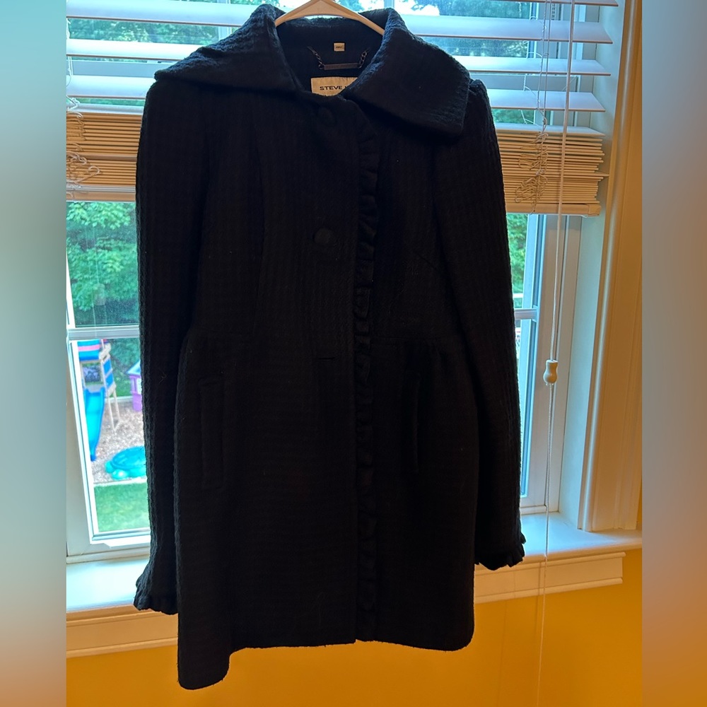 Chic wool.  Fitted around the waste.